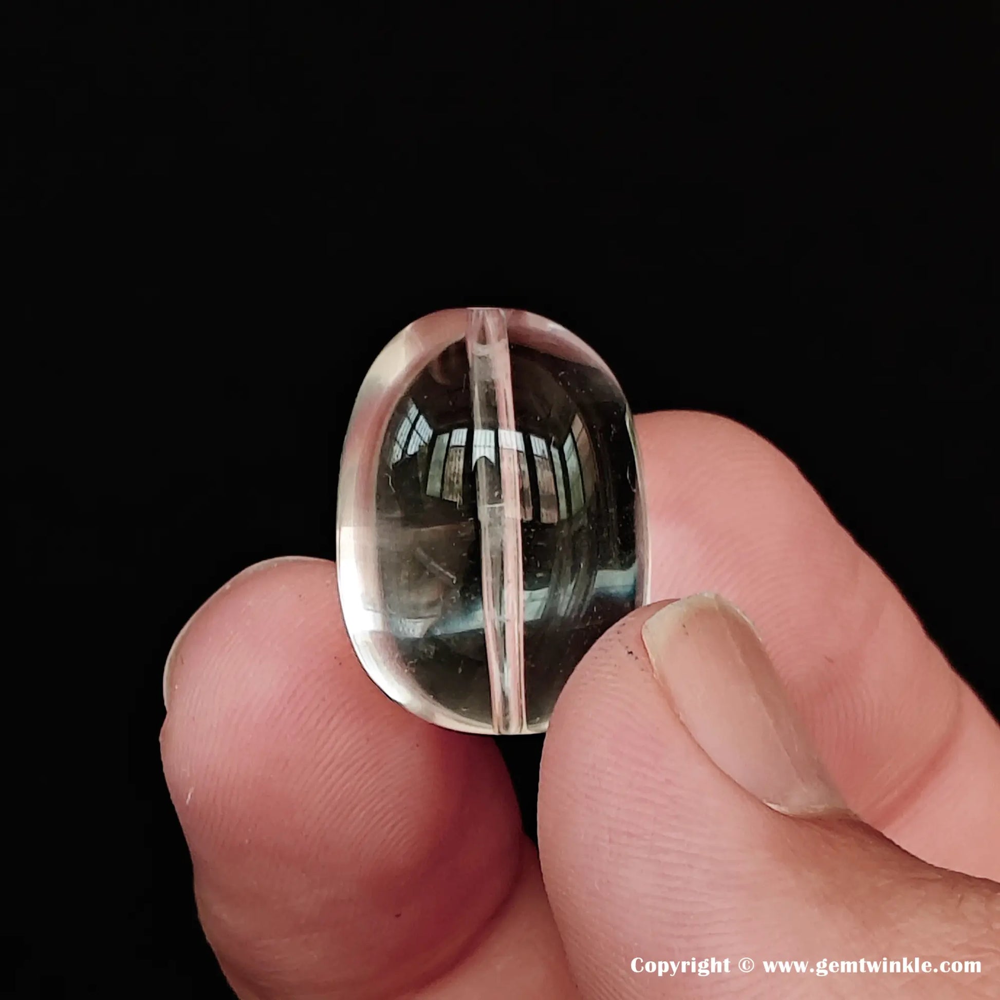 Side view details of a natural unheated clear quartz crystal candy shape loose bead for handcrafted jewelry making and DIY studios