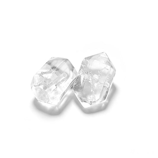 Natural clear quartz double terminated point bead with horizontal drill hole on isolated white background