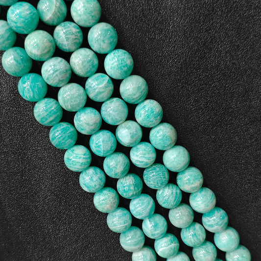 Natural Grade B amazonite 13-15mm large round gemstone beads macro close up showing white feldspar banding