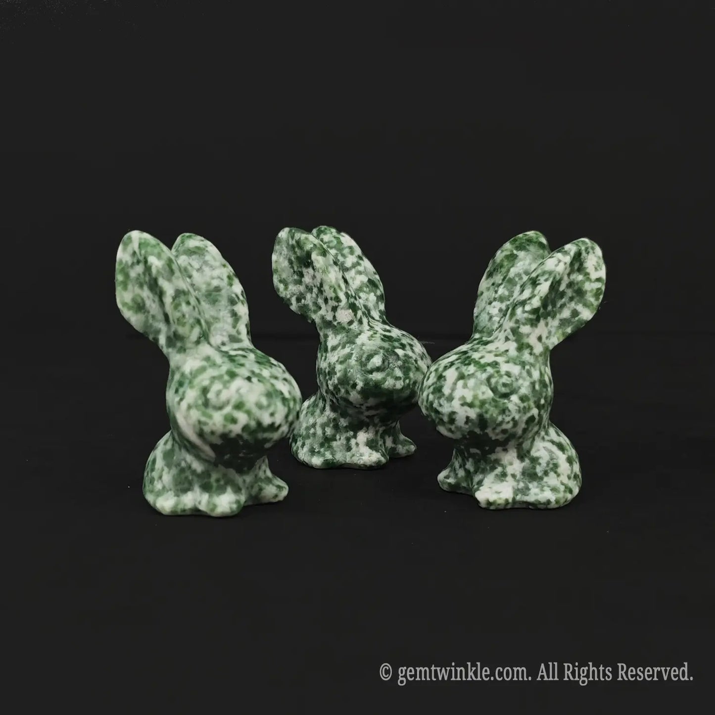 Multiple views of natural green snowflake jasper rabbit statues in 4cm size for low MOQ boutique inventory replenishment