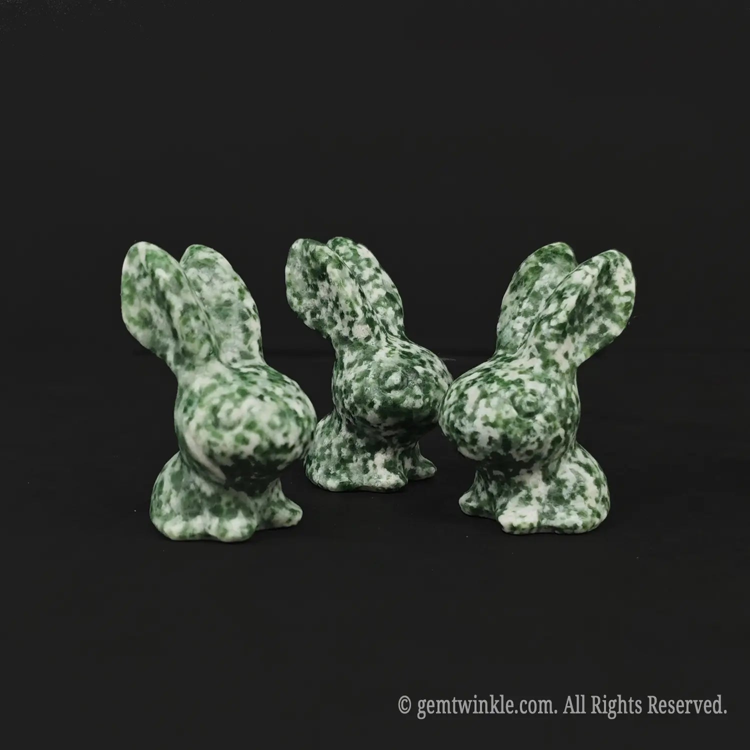Multiple views of natural green snowflake jasper rabbit statues in 4cm size for low MOQ boutique inventory replenishment