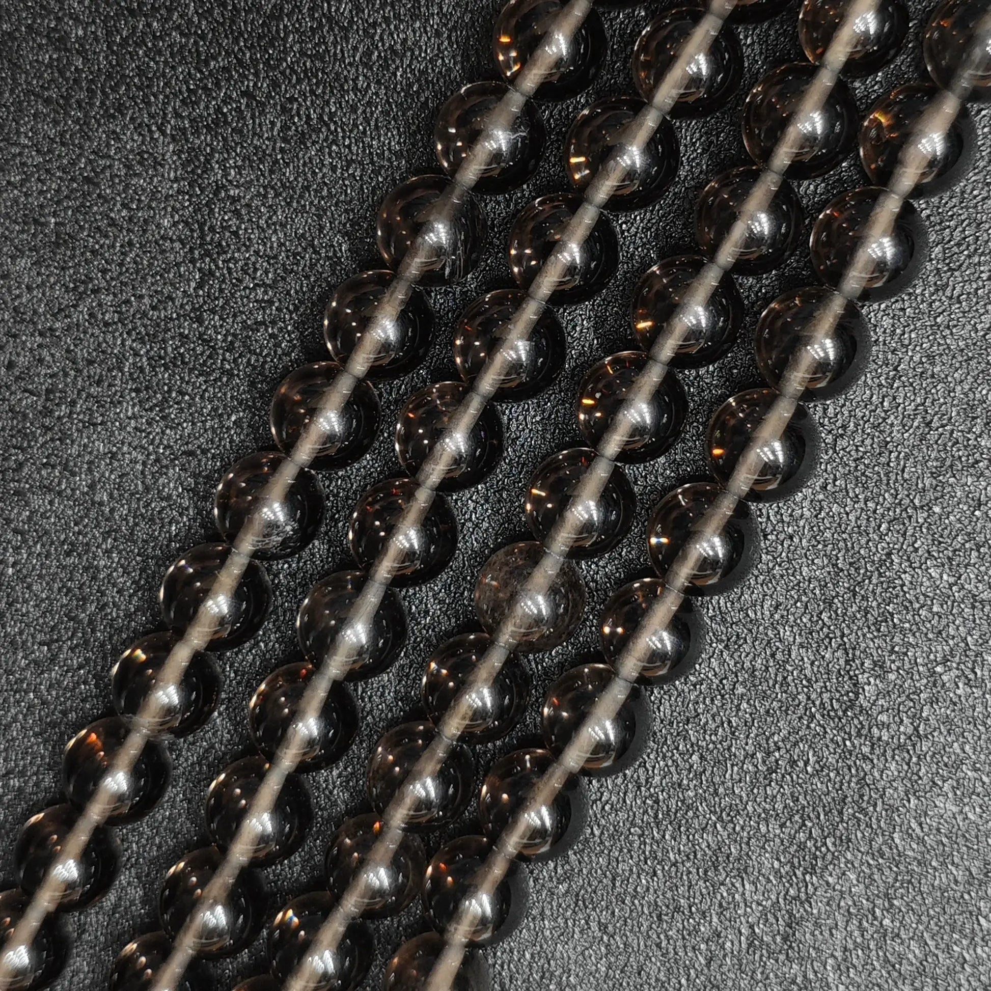Natural ice obsidian crystal beads from tiny micro 2mm and 3mm spacer sizes up to 14mm strands