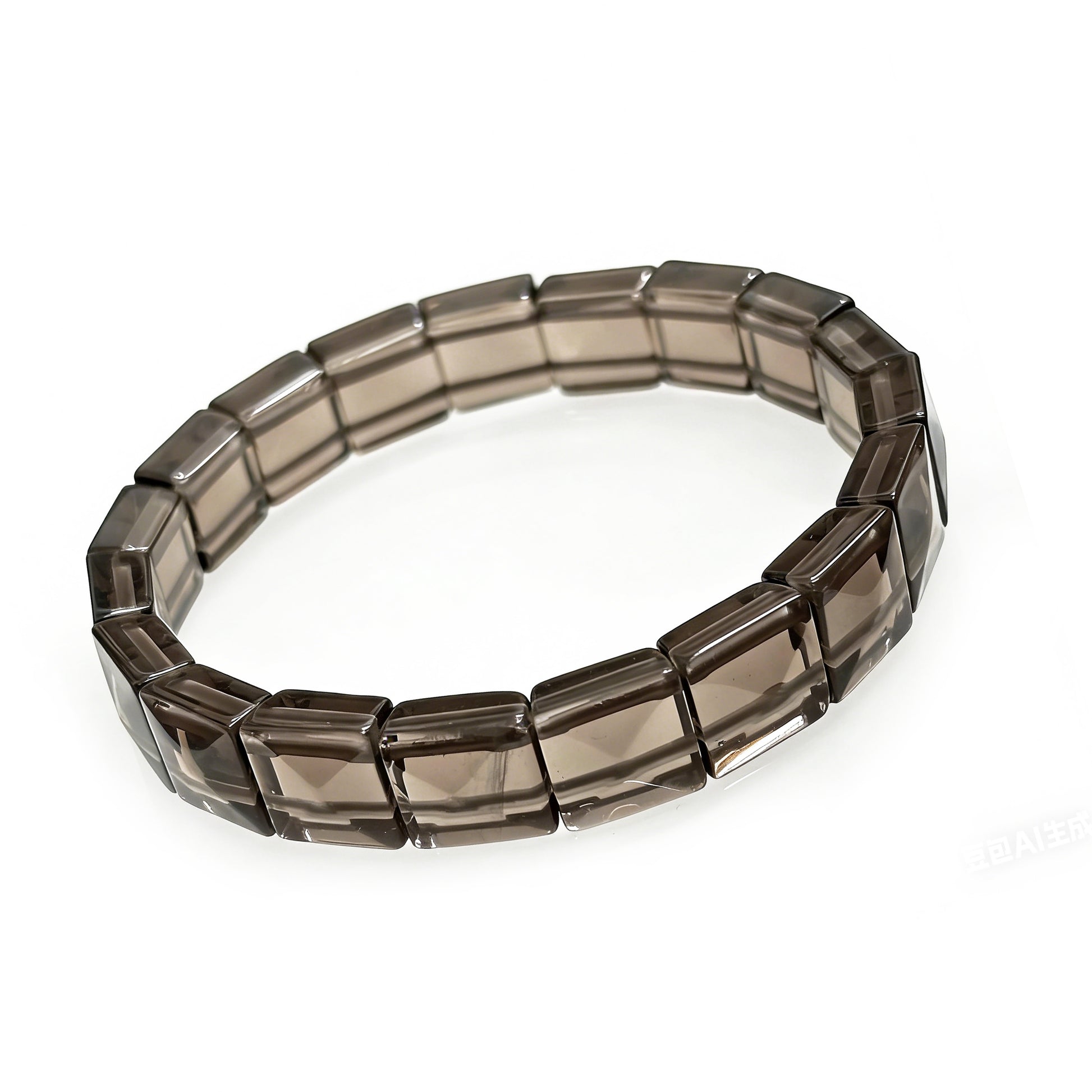Close-up of natural icy obsidian rectangular bead bracelet, showcasing smooth faceted texture and translucent smoky color, Gem's Twinkle brand.