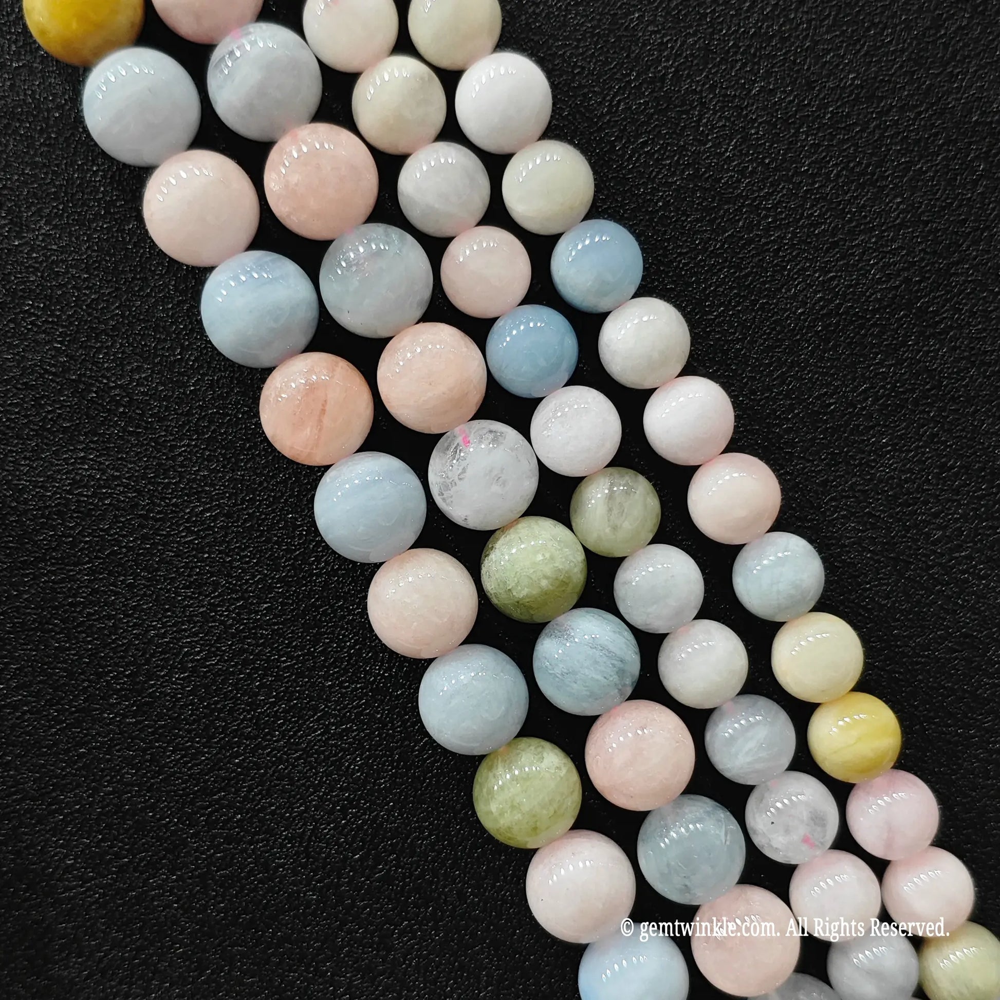 Parallel wholesale strands of natural mixed opaque beryl commercial morganite crystal beads featuring budget friendly B minus grade from image_cc95a3.jpg
