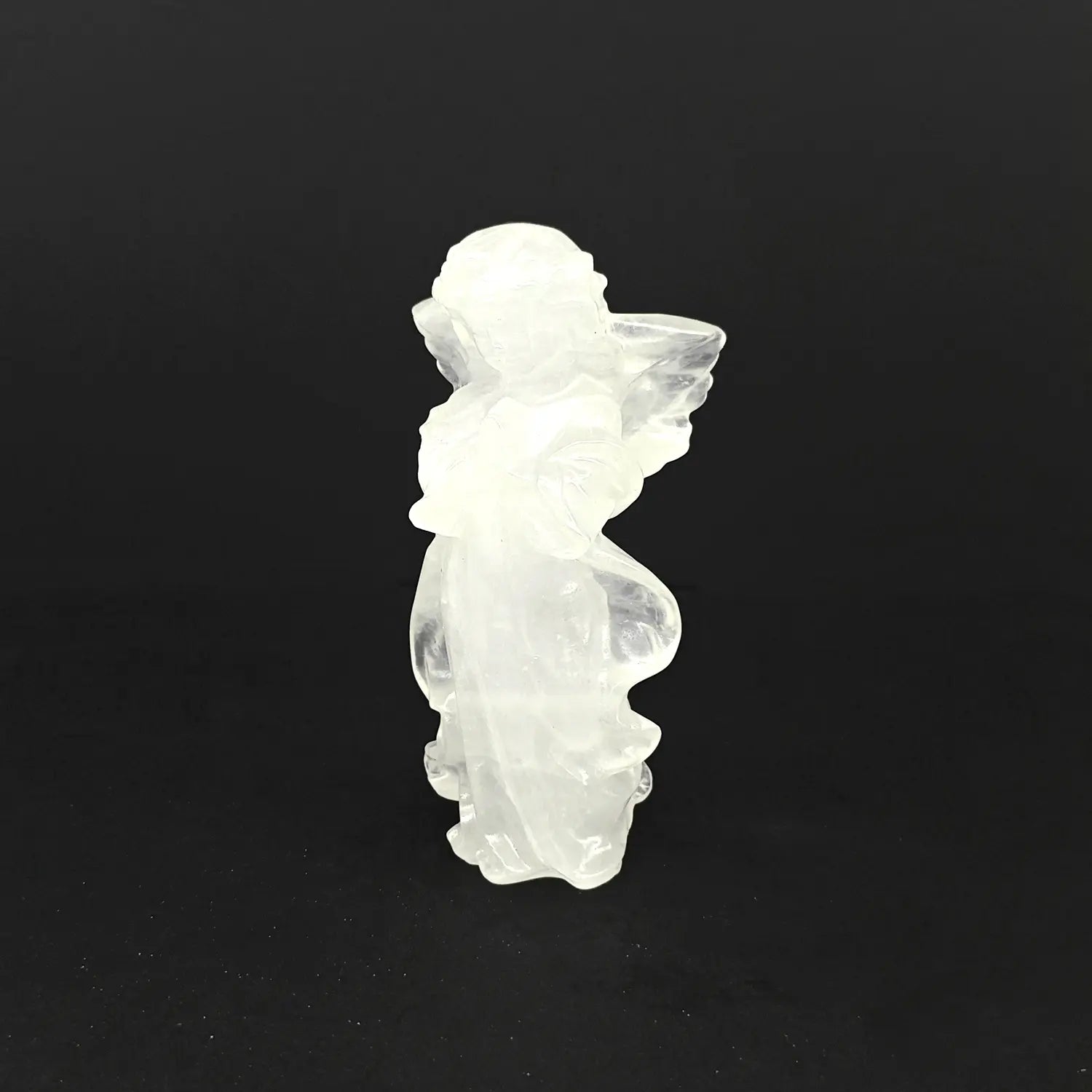 10cm hand-carved natural milky snow quartz praying guardian angel statue on a dark background, perfect for spiritual decor