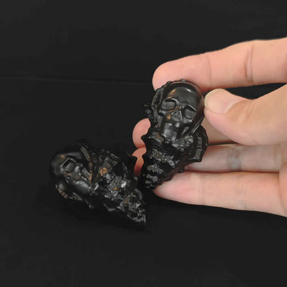 Natural obsidian conch skull carving shown from image_36df67.jpg with high-polish black finish