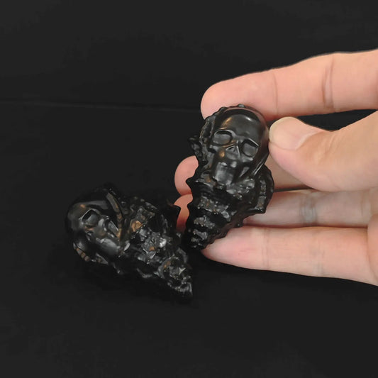 Natural obsidian conch skull carving shown from image_36df67.jpg with high-polish black finish