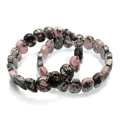 Natural Rhodonite Oval Bead Bangle Bracelet - Detailed View of Pink and Black Stone Pattern