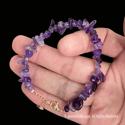 natural purple amethyst raw chip nugget bracelet held on hand showing irregular gemstone beads