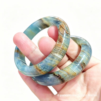 natural blue calcite stone bangle side view stock