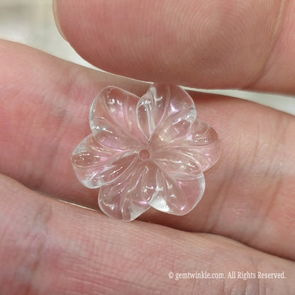 Natural crystal flower bead for handmade jewelry making displayed under studio lighting