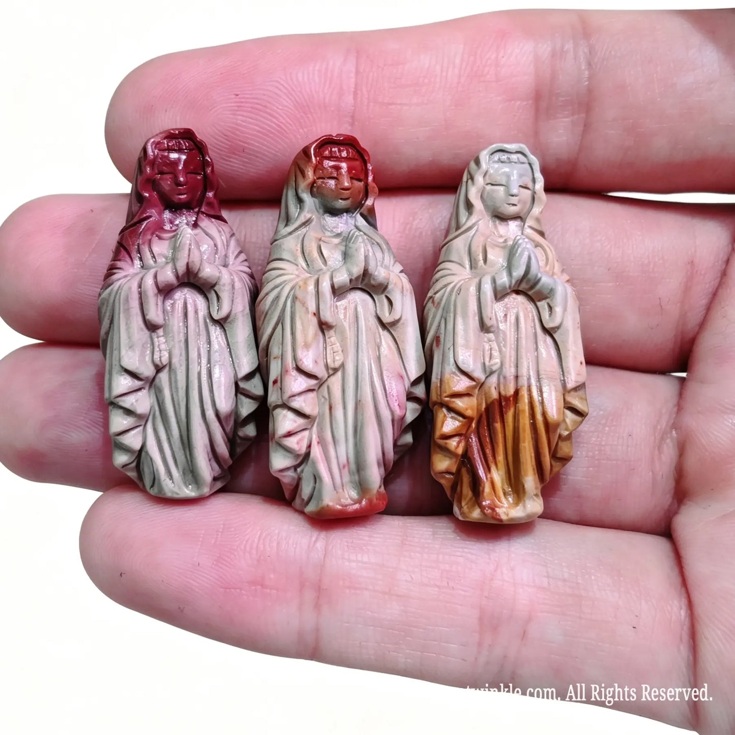 Assortment of hand-carved Alashan Gobi agate Virgin Mary figurines for small shop inventory