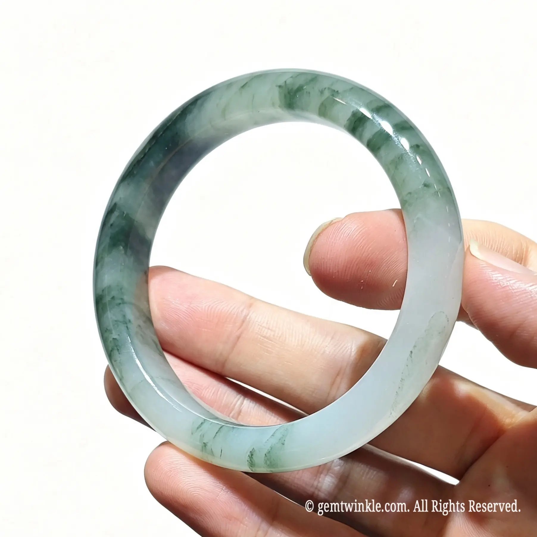 Top view of two natural tianshan green quartzite bangles held together for small shop inventory