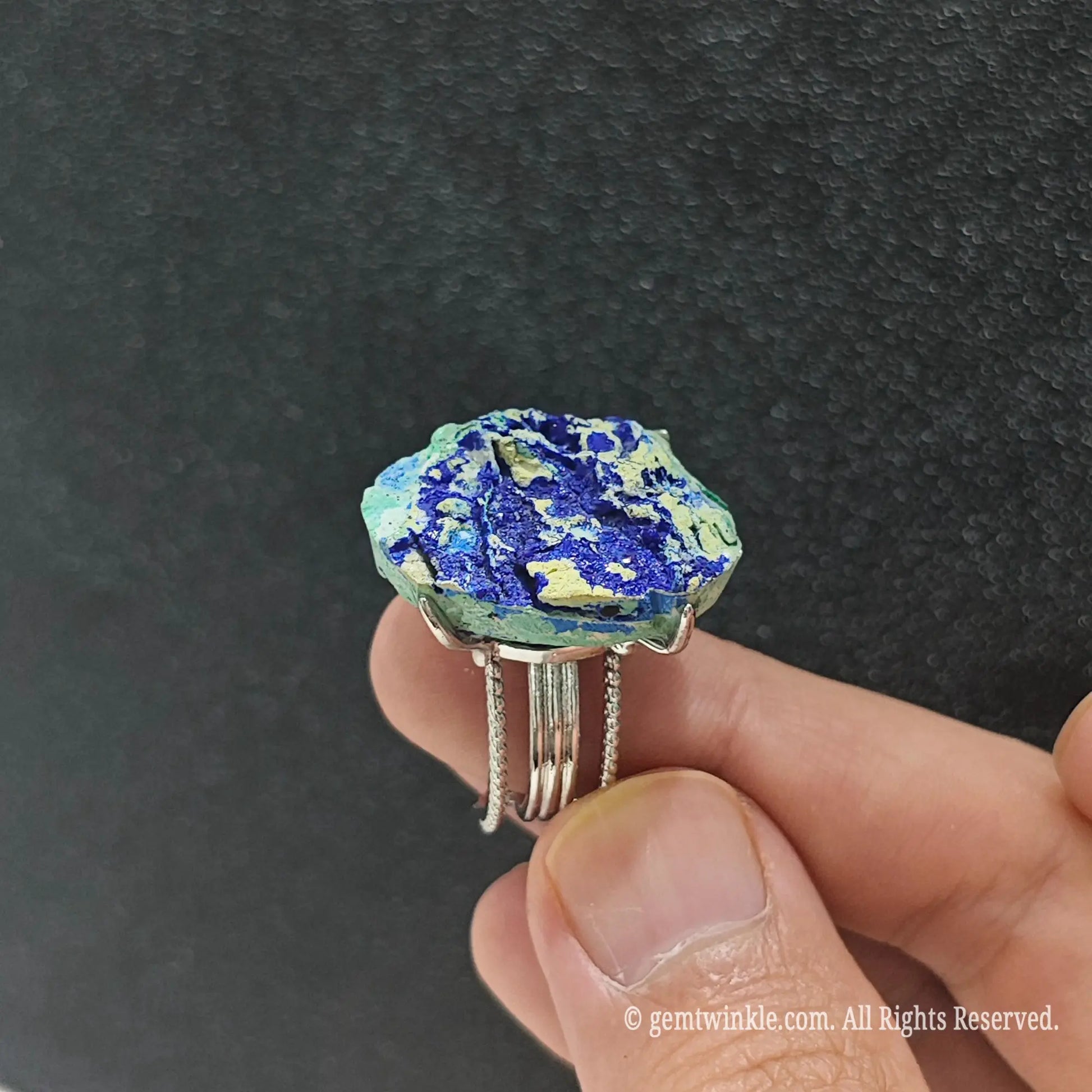 Natural matrix azurite ring showcasing the multi strand adjustable open alloy ring band and raw stone underside