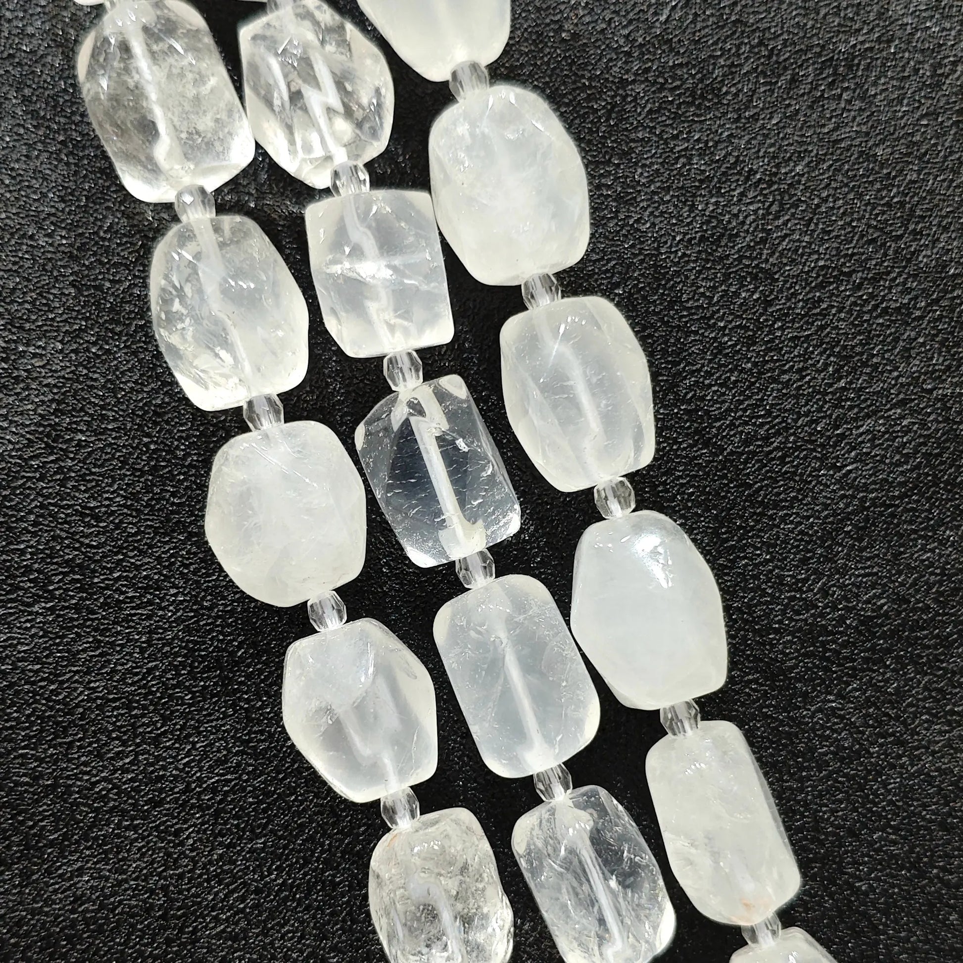 natural milky clear quartz faceted barrel beads full strand overview