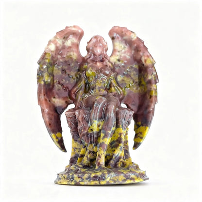 Single natural mookaite jasper dark angel statue 11cm height in purple and yellow mineral pattern with matte finish on white background