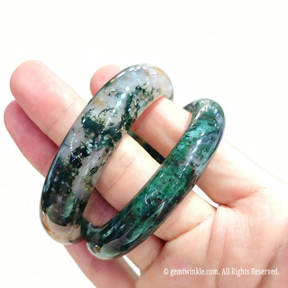 Side profile of natural moss agate gemstone bangles showing smooth polished edges