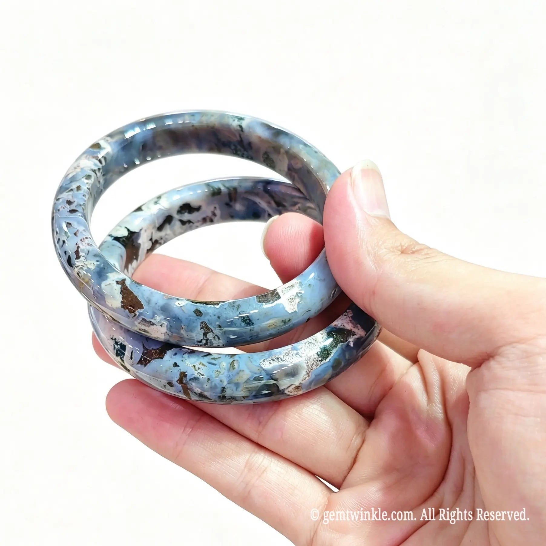 Side view of natural ocean jasper gemstone bangles showing smooth rounded edge polish