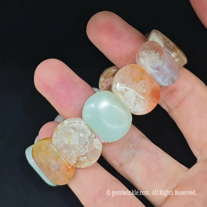 Natural pastel blossom agate smooth rectangular bead bracelet side profile highlighting smooth surface polish
