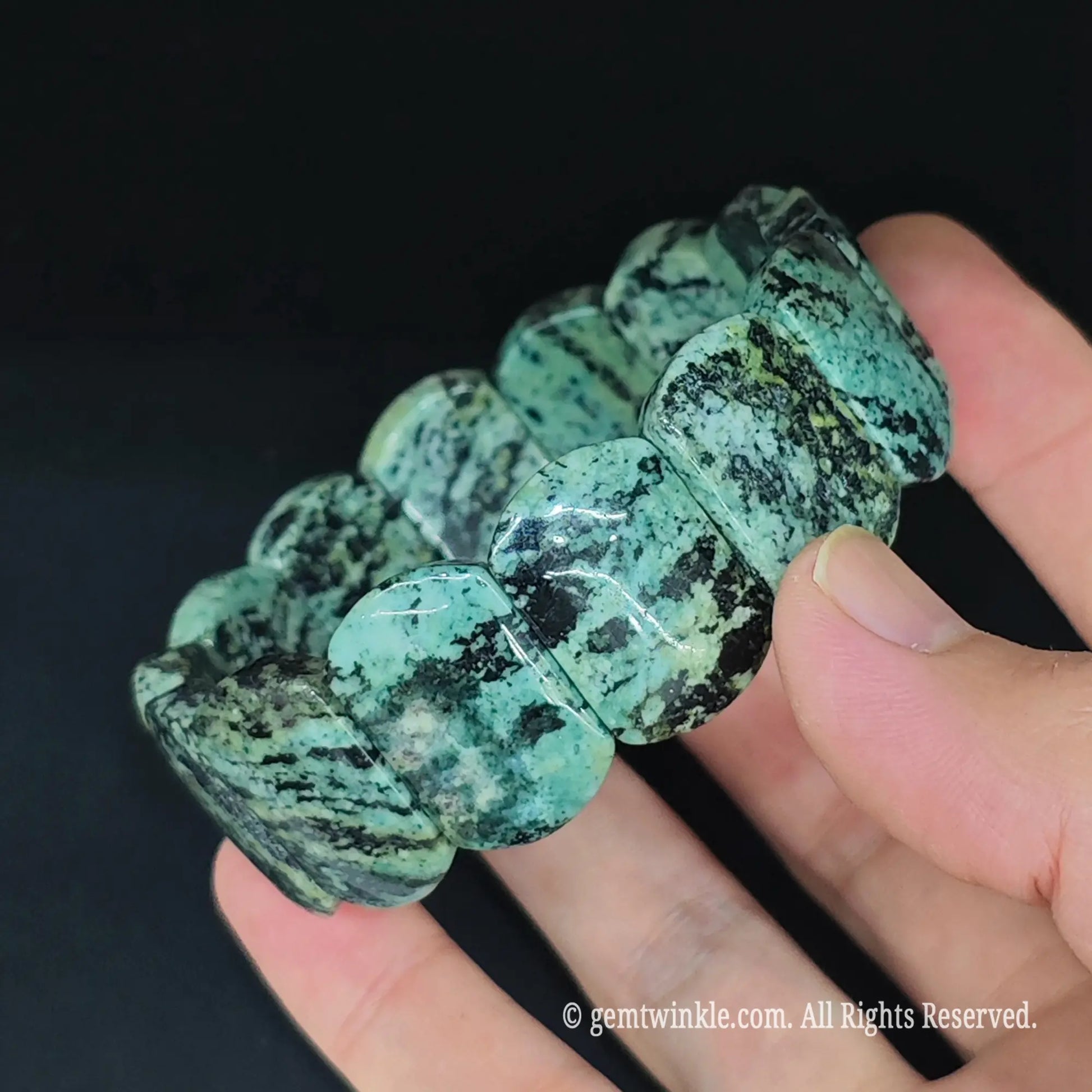 Natural peacock jasper smooth rectangular bead bracelet side view showing rounded polished edges and glossy finish