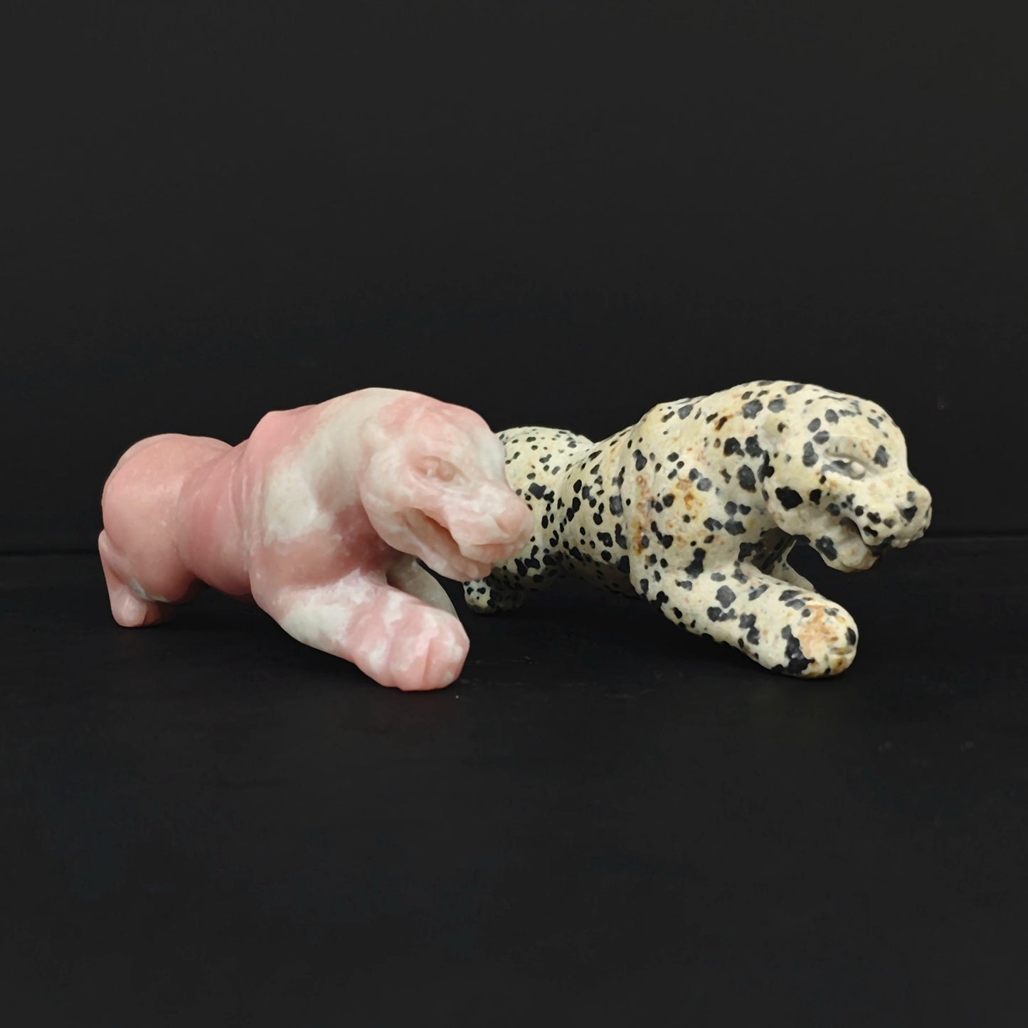 Hand carved gemstone leopard statue in pink opal and spotted dalmatian jasper stone crouching panther crystal animal carving for wholesale crystal sourcing