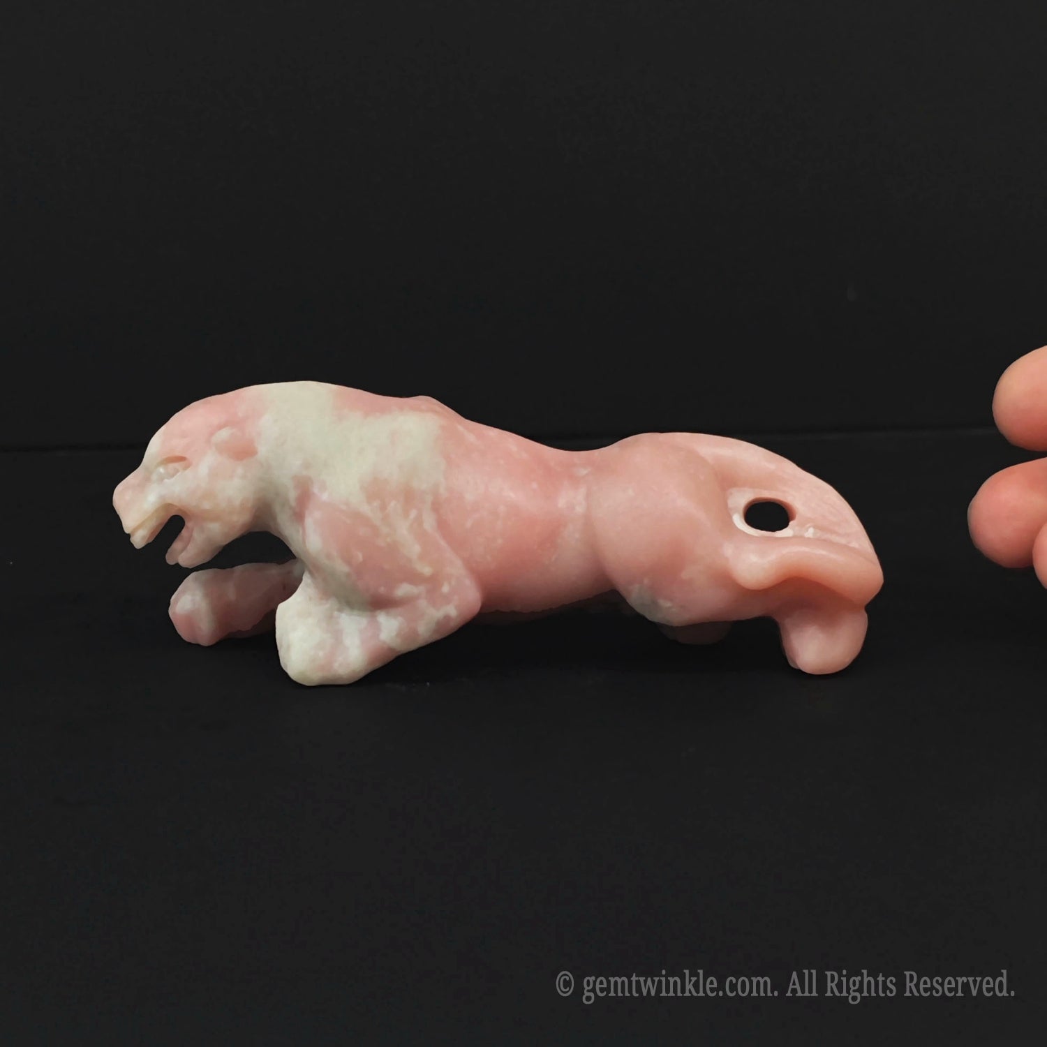 Handmade pink opal panther figurine showing the organic soft pink mineral textures and premium big cat posture design