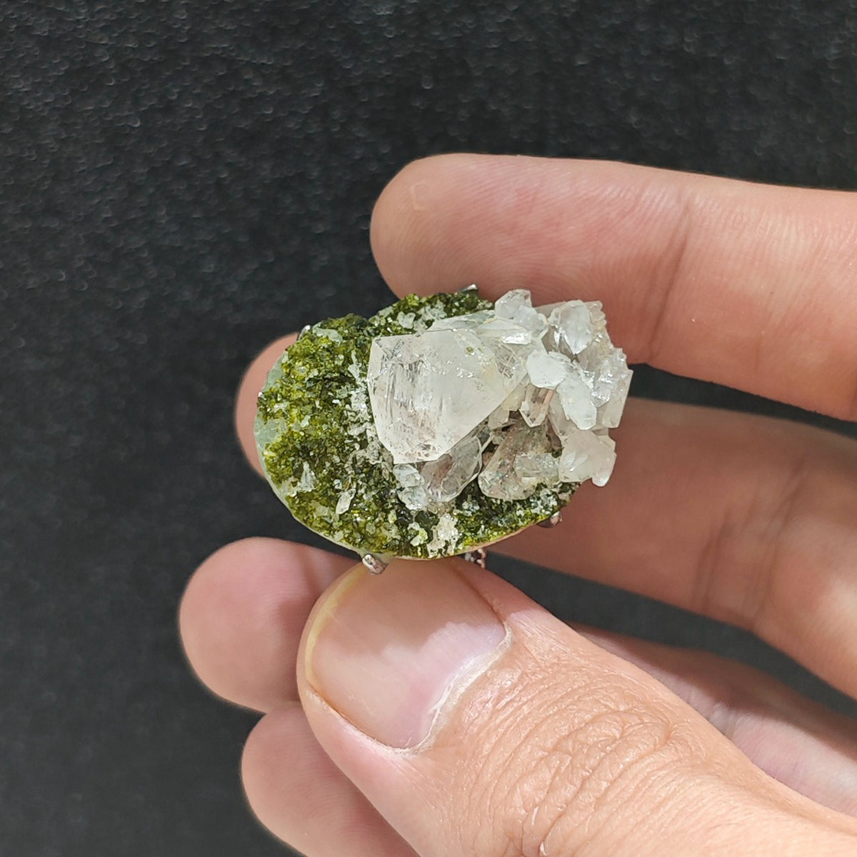 Natural raw epidote specimen ring back view highlighting the adjustable open metal ring band
