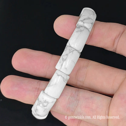 side view of 16mm rectangular white howlite stone segment stretch bracelet