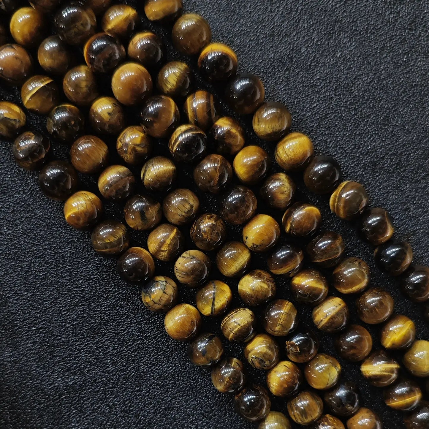 Natural budget grade b minus yellow tiger eye loose round beads strand with visible mineral clefts