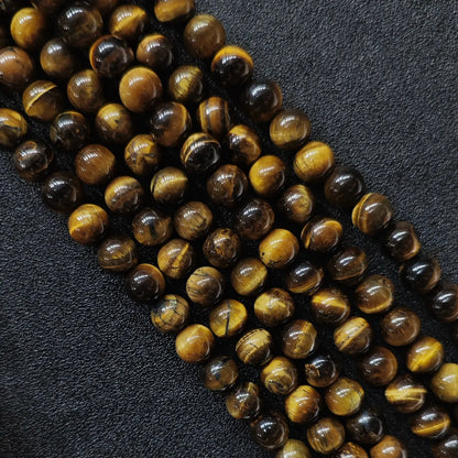 Natural budget grade b minus yellow tiger eye loose round beads strand with visible mineral clefts