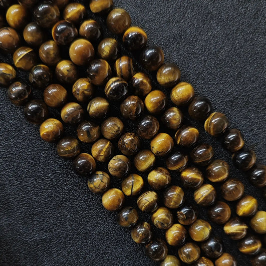 Natural budget grade b minus yellow tiger eye loose round beads strand with visible mineral clefts