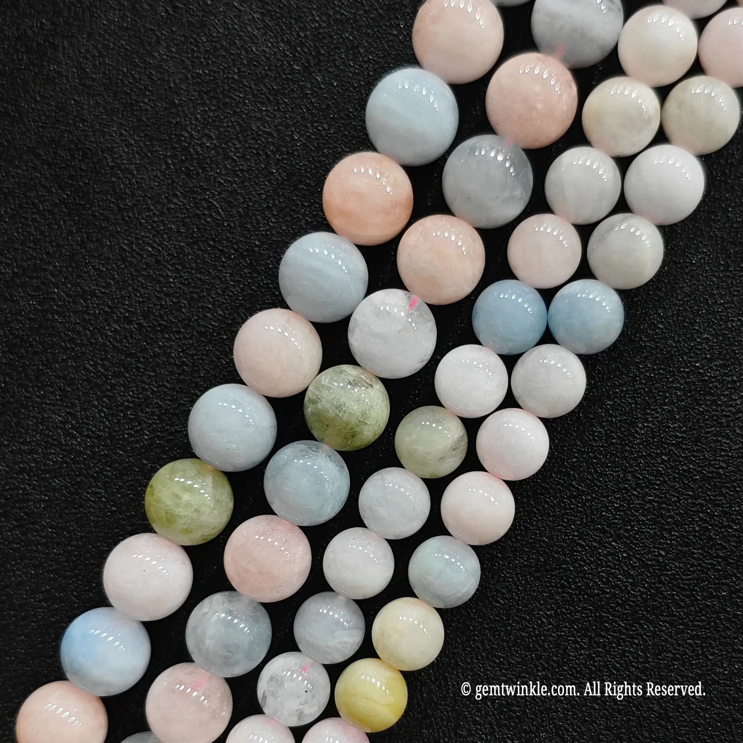 Clean display of opaque multi color morganite crystal beads in B minus grade highlighting smooth glossy porcelain finish and dense colors from image_cc95a3.jpg