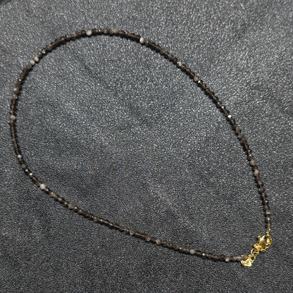 Wholesale silver sheen obsidian gemstone necklace featuring 3mm micro faceted beads and gold extension chain