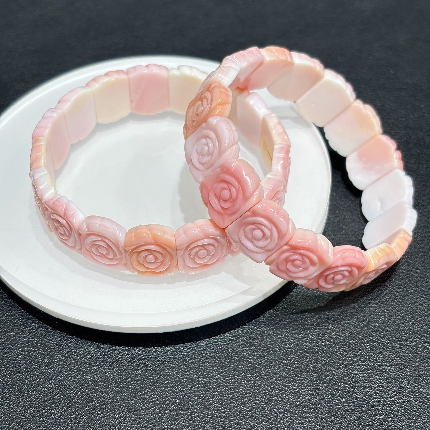 Stack of Pink Conch Shell Rose Bracelets