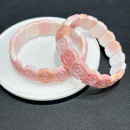 Stack of Pink Conch Shell Rose Bracelets