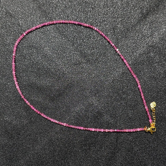 Clarity enhanced Pink Tourmaline gemstone collar necklace featuring 2.5mm square cube beads and gold extension chain