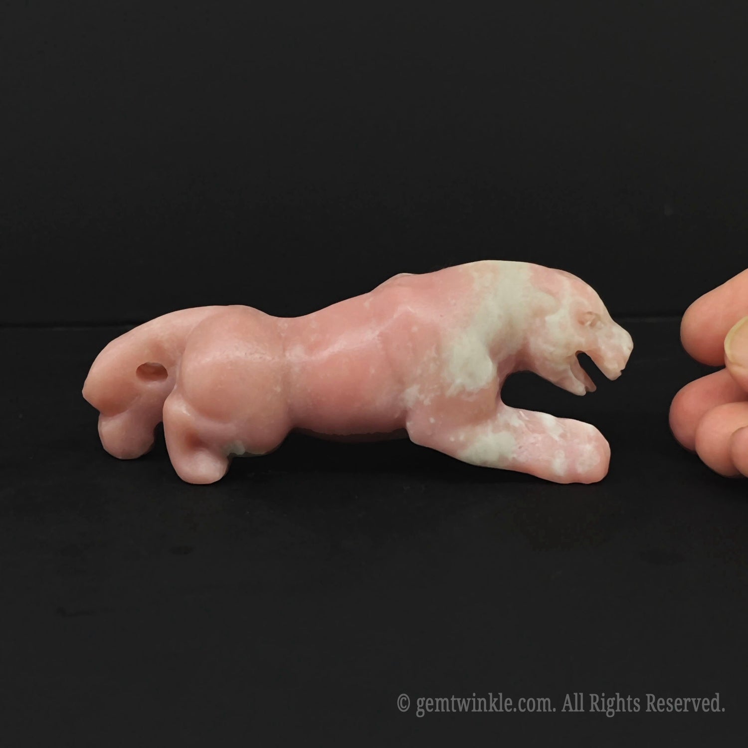 Polished pink opal crouching leopard statue for crystal shop owners looking for premium hand sculpted animal decor with low moq