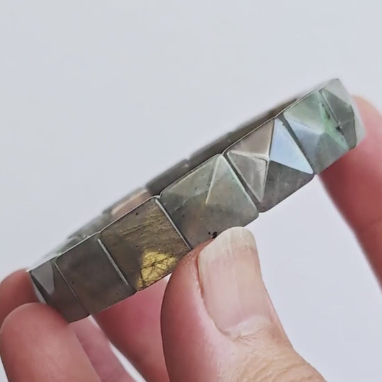 Moonstone bracelet displaying adularescence—shifting blue-green iridescence under light
