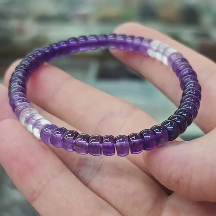 Natural amethyst disc bead bracelet with clear quartz spacers, flat-cut purple gemstone beads, 17cm length, ideal for stacking and mindful wear
