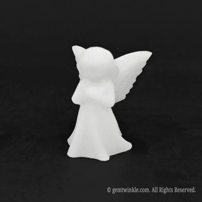 Full front view of a pure white marble pocket angel statue used as a sympathy keepsake or healing comfort stone