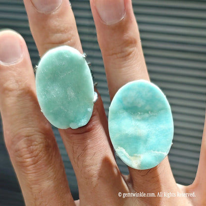 raw blue aragonite slab rings showcasing light blue hues and natural mineral textures