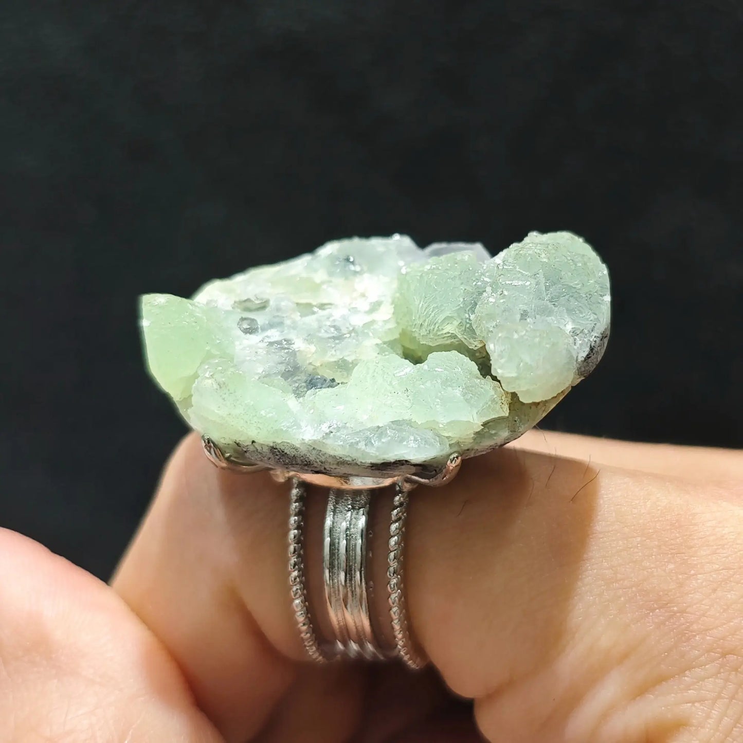 Raw green fluorite crystal cluster adjustable alloy ring worn on hand showing mint green mineral points and alloy band
