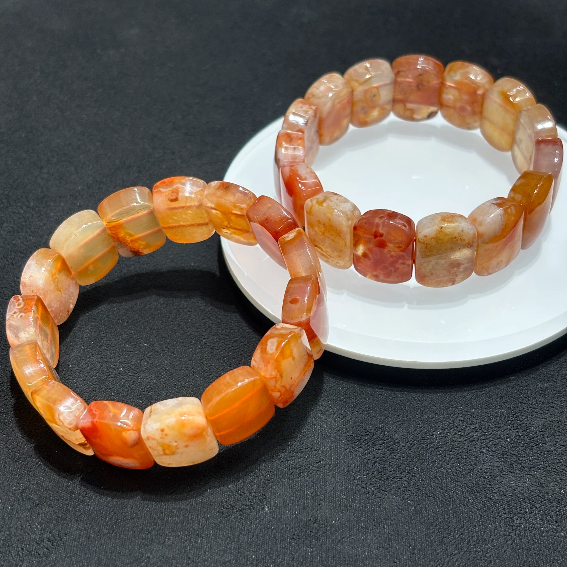 Red Flower Agate Bracelet on White Plate
