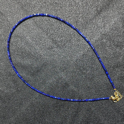 Royal Lapis Lazuli gemstone collar necklace featuring 2.5mm square cube beads and gold extension chain