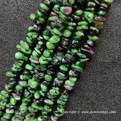 Multiple parallel ruby in zoisite irregular chip bead strands