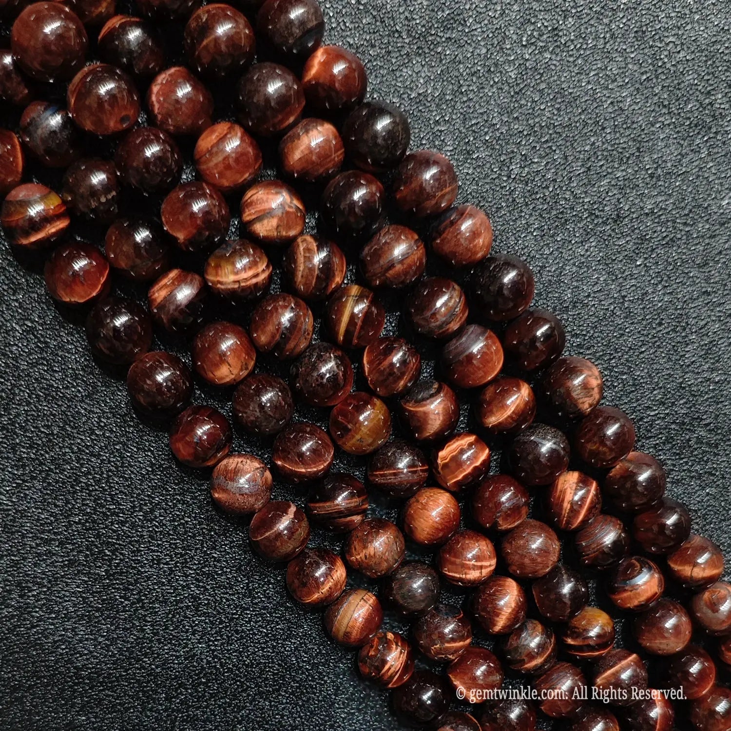 Earthy red tiger eye loose round beads strands with prominent internal fracture lines for rustic jewelry