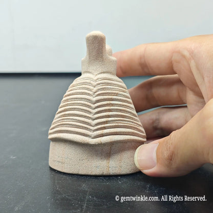 back profile of natural sandstone horus bust sculpture showing detailed ridges on royal headcloth