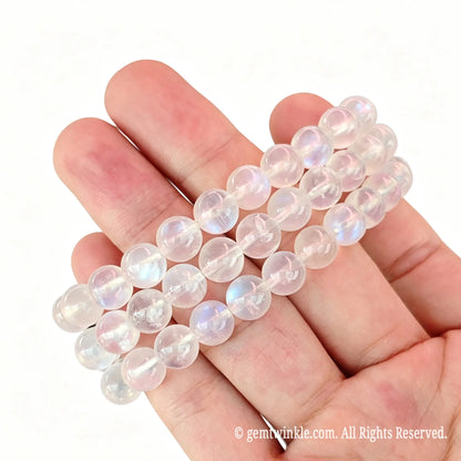 Preview of single-strand moonstone round bead bracelet showing blue adularescence shimmer