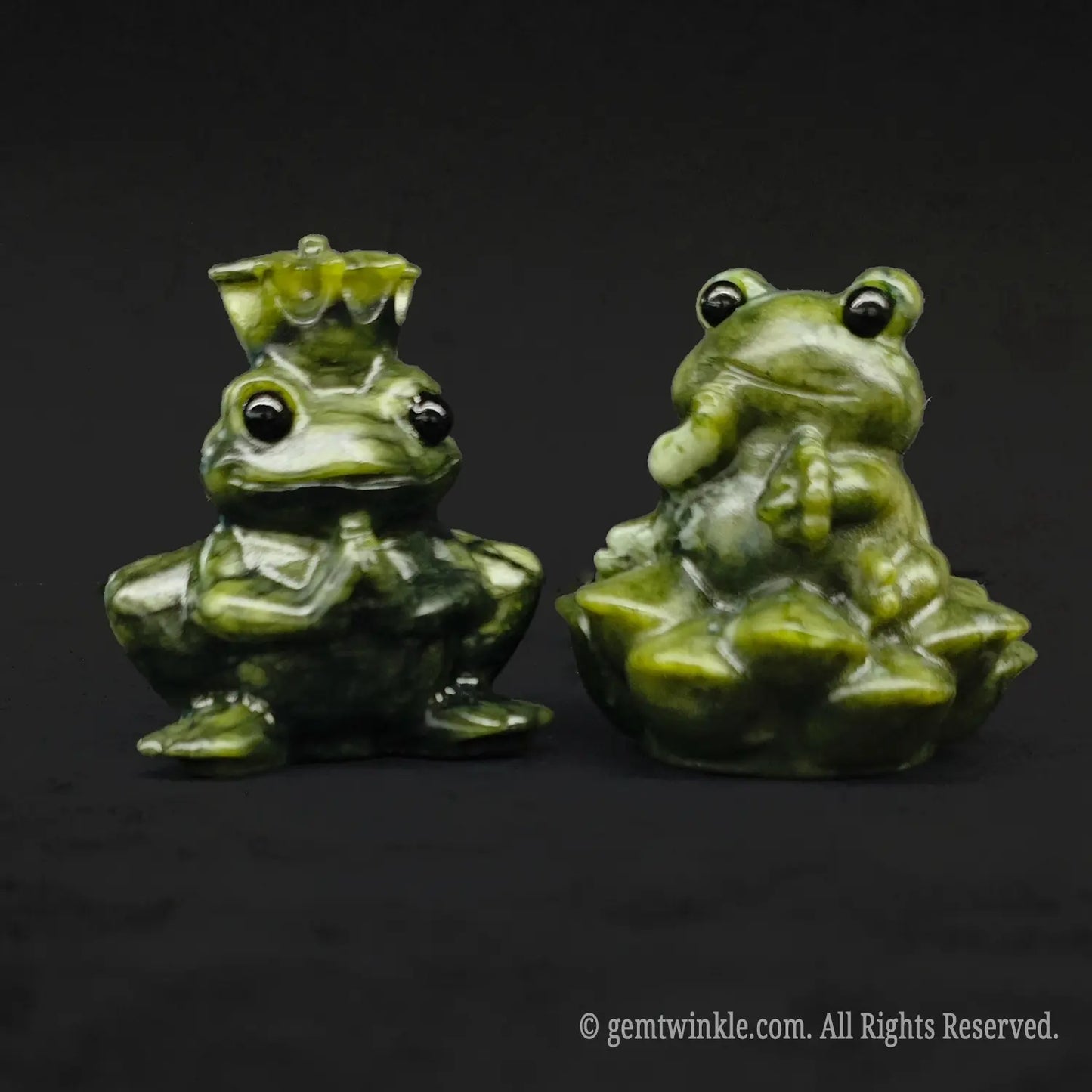 Close up front view of a serpentine stone fairy tale toad figurines set featuring the sweet princess posing with her hand to her cheek