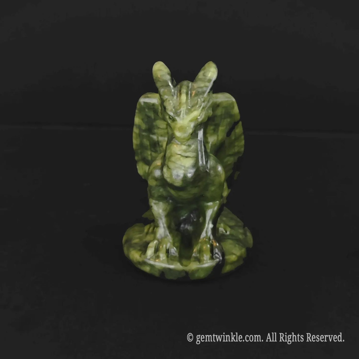 Green serpentine stone dragon sculpture